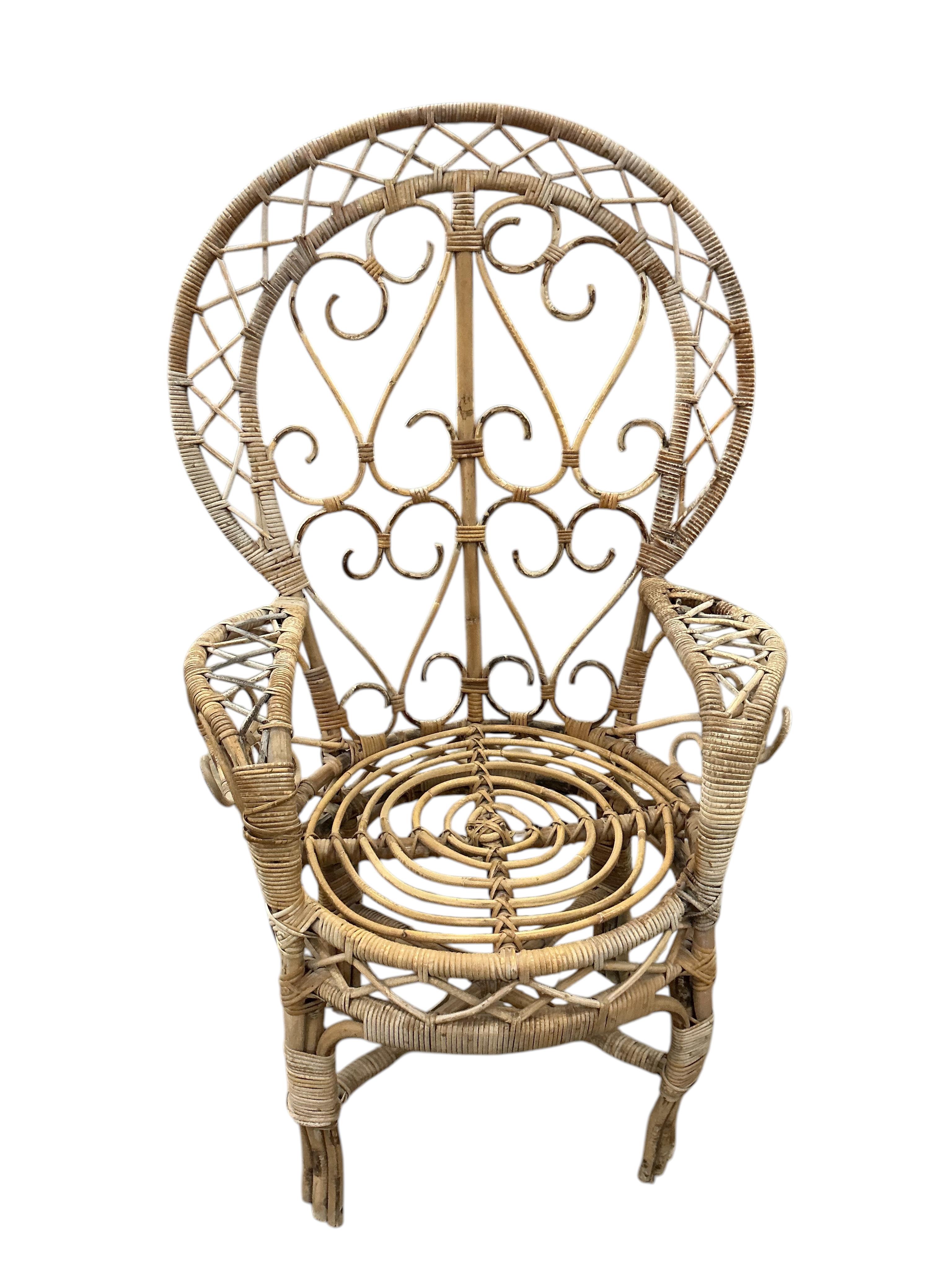 A pair of mid century caned bamboo peacock chairs, width 80cm, depth 56cm, height 134cm